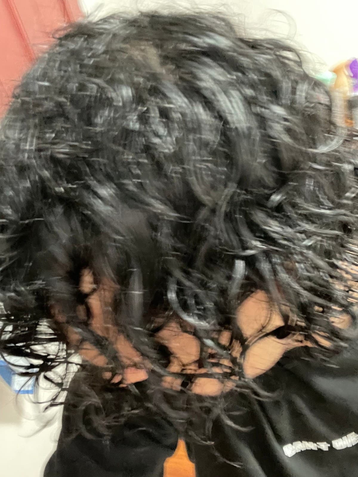 Back of the head with clean wet curls